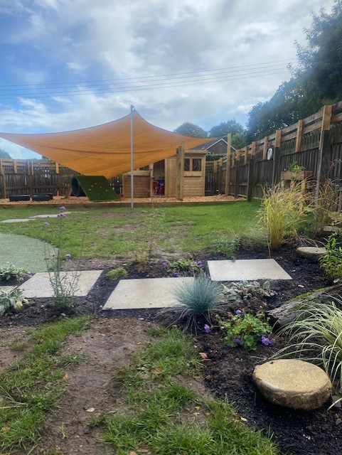 pre school garden after planting and sail canopy
